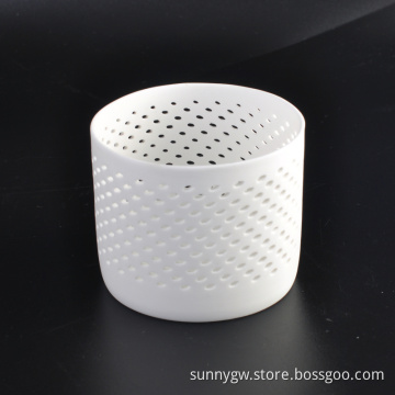 white hollow out ceramic cylinder candle holder